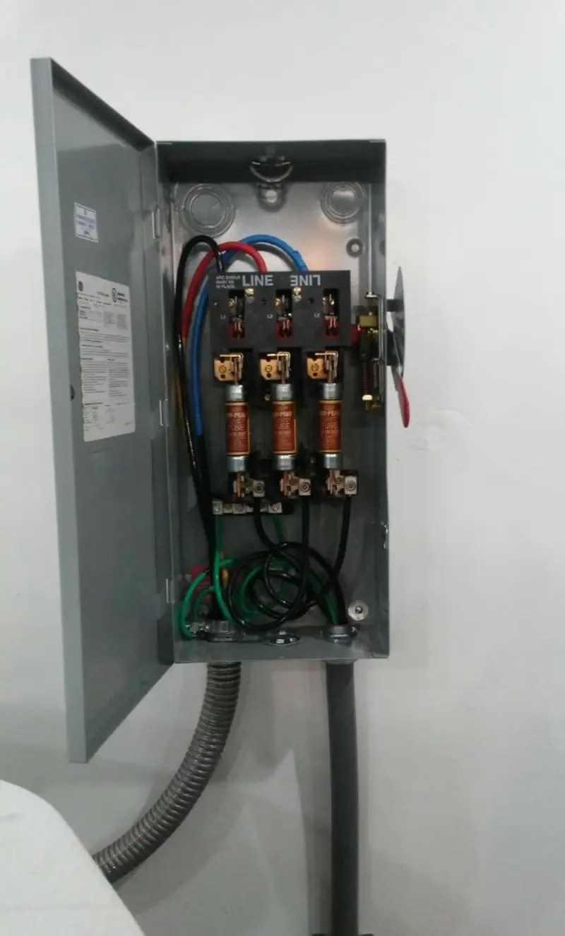 Three-phase disconnect switch installed for Smoke Detector Installation in Sun Village